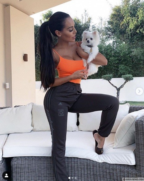 Sofia with her dog in Marbella pad