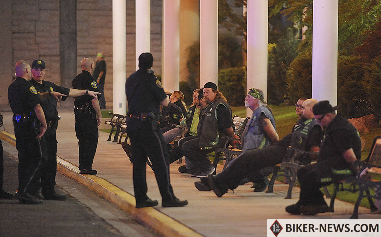 In this Sept. 23, 2011, file photo, police officers keep an eye on handcuffed men at the east entrance to John Ascuaga’s Nugget hotel-casino after a shooting in Sparks, Nev. Jury selection begins Monday, July 29, 2019, in federal court in Las Vegas, for the racketeering trial of eight accused Vagos motorcycle club members in a sweeping case stemming from the killing of a rival Hells Angels leader from California in a shooting at the northern Nevada casino nearly eight years ago. (The Reno Gazette-Journal via AP, File)