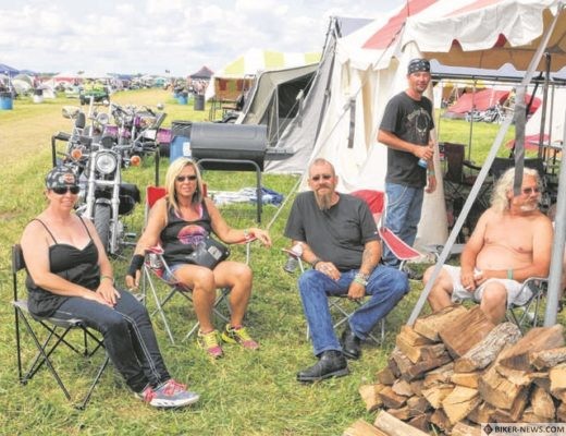 A group from Indiana relaxes at a campsite at last year’s Wetzelland. From left to right are Wendy Winget, Terri Bonjour, Kevin Bonjour, Mark Winget and Dustin Wingate.