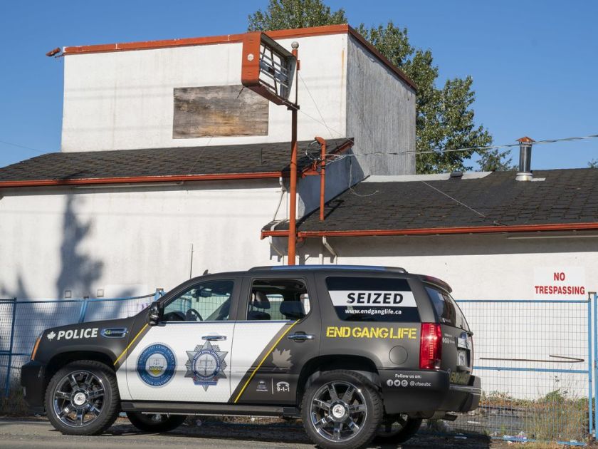 A vehicle belonging to The Combined Forces Special Enforcement Unit of British Columbia sits in front of the former Nanaimo Hells Angels clubhouse in Nanaimo. Photo: Richard Lam/Postmedia