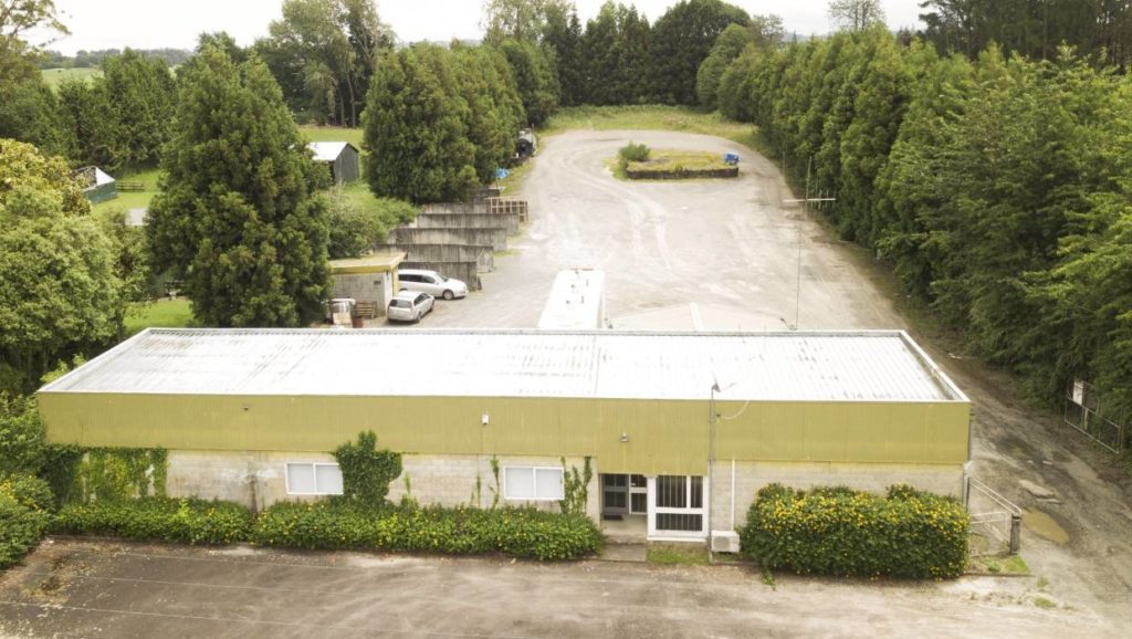 A member of the Head Hunters is taking the South Waikato District Council and Raukawa Iwi Development Limited to court over the sale of this Dumfries Rd, Tokoroa property.