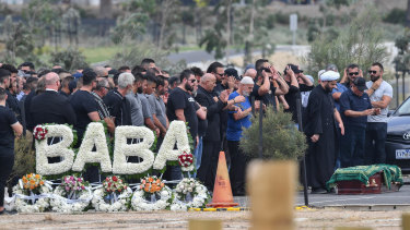 Mourners at Fawkner cemetery.