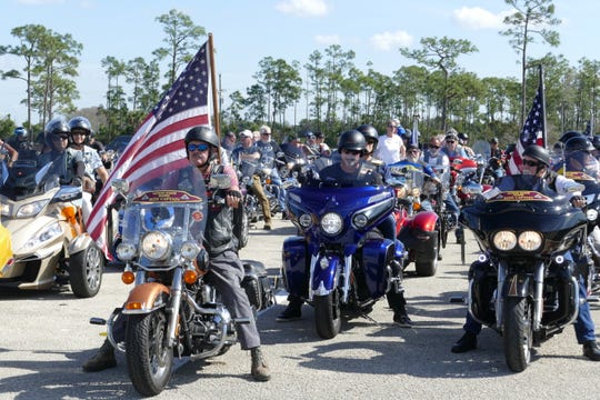 Hundreds of bikers at the I-75 rest stop by exit 131 get ready to escort The Wall That Heals from Fort Myers to Marco Island on Feb. 18, 2020.