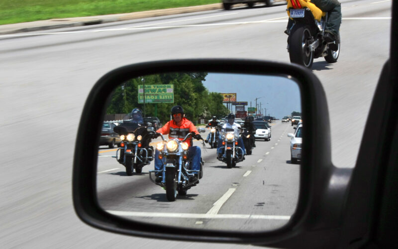 Motorcycles in car mirror