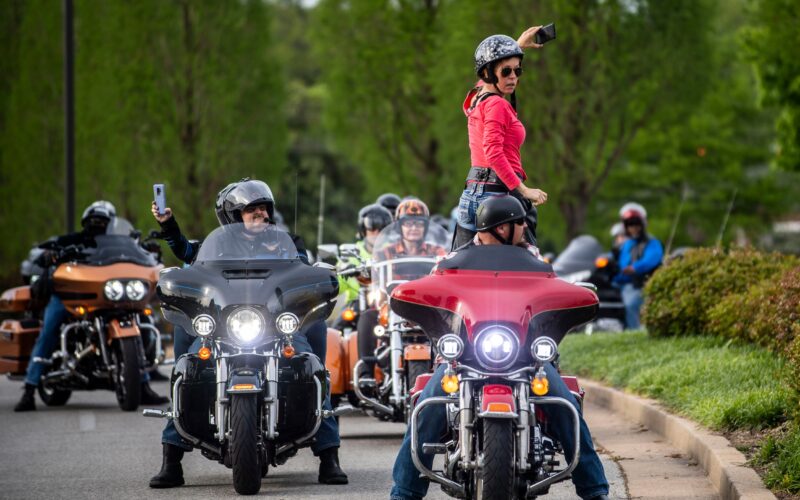 Amber Thompson signals the motorcyclists to rev their engines while she holds her cellphone to show their support to all the health care workers in West Tennessee, in Jackson, Tenn, Tuesday, April 28, 2020. The motorcyclists rode a lap at local hospitals and donated food. (Photo: Stephanie Amador / The Jackson Sun)