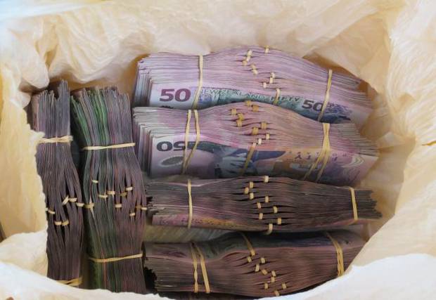 Some of the cash seized from the Head Hunters at the end of the undercover operation in December 2016. Photo / Supplied